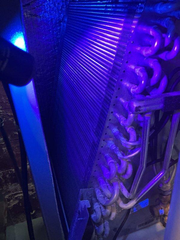 Completed annual cooling maintenance on HVAC system. Performed comprehensive inspection of evaporator coil, refrigerant lines, and associated components. Documented system condition with photographic evidence showing clean coil fins, properly secured copper refrigerant tubing, and accumulator assembly. All components operating within normal parameters with no deficiencies noted.