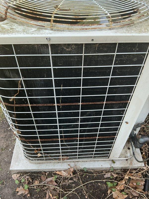 Completed annual cooling maintenance on outdoor heat pump unit. Performed comprehensive system inspection including visual assessment of cabinet condition, coil cleanliness, and refrigerant line connections. Unit showed signs of normal weathering with minor rust staining on frame and debris accumulation around base. Conducted diagnostic testing with electrical meters to verify proper system operation and performance parameters. All components functioning within manufacturer specifications at time of service.