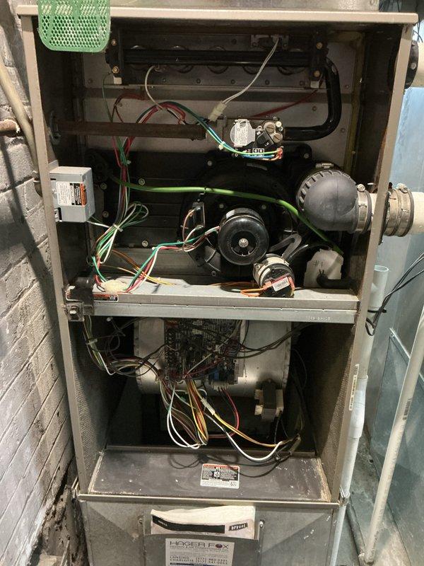 Performed comprehensive annual heating check and tune-up on residential gas furnace system. Conducted thorough inspection of all internal components including heat exchanger, burner assembly, blower motor, gas valve, ignition system, and electrical connections. Verified proper burner operation with clean blue flame pattern across all ports. Tested and confirmed blower motor function, checked all electrical connections and wiring throughout the unit, and inspected control board operation. Cleaned burner assembly and internal components as needed, verified proper airflow, and ensured all safety controls were functioning correctly. System operating efficiently with no issues identified.