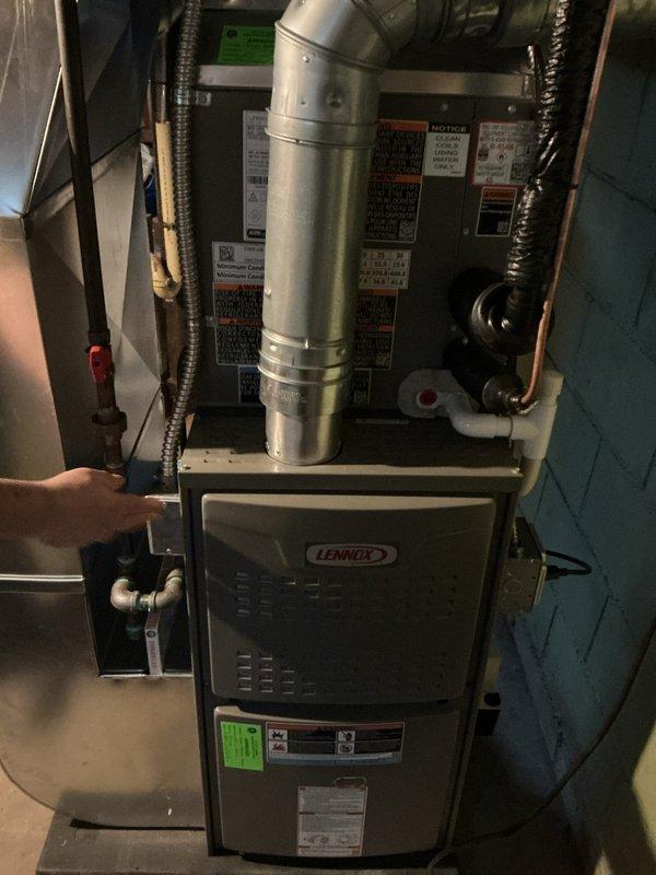 Completed recurring AHC maintenance on residential Lennox furnace system. Inspected unit operation, ductwork connections, and refrigerant lines for proper function. Removed and evaluated air filter showing moderate dust accumulation; filter assessed for cleaning or replacement to maintain optimal airflow and system efficiency.