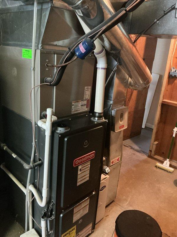 Performed comprehensive cooling tune-up on Goodman HVAC system. Completed full system inspection including evaporator coil examination under UV light, verified refrigerant line connections and integrity, checked all copper piping for proper insulation and secure mounting. Inspected condensate pump operation and drainage system, confirmed furnace and air handler components functioning properly. System tested and operating within normal parameters, ready for cooling season.