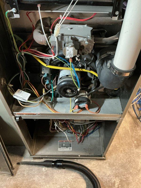 Completed annual heating checkup on residential furnace system. Performed comprehensive inspection of gas valve assembly, blower motor, electrical connections, and burner components. Removed and cleaned burner assembly, verified proper operation of all safety controls, and documented system condition with photographs. All components found to be functioning within normal parameters with no immediate repairs required.