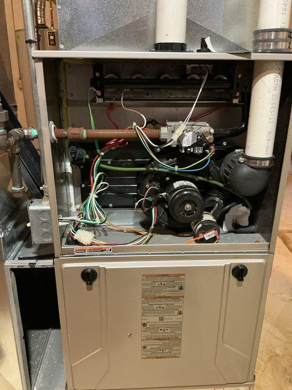 Completed annual HVAC maintenance inspection on residential heating and cooling system. Performed comprehensive evaluation of outdoor condensing unit and indoor furnace assembly, checking all mechanical and electrical components for proper operation. Replaced air filters and humidifier pads, cleared humidifier drain line to ensure proper moisture management and prevent overflow issues during heating season operation.