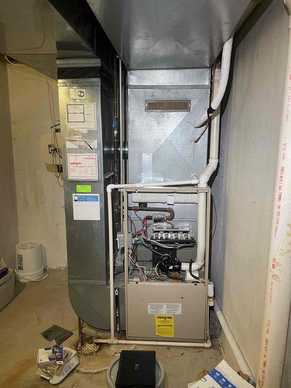 Completed estimate for furnace replacement on 30-year-old unit currently located in basement. Unit is operational at this time but nearing end of expected service life. Documented existing system configuration including ductwork connections, venting arrangements, and electrical setup to provide accurate replacement specifications and pricing for customer consideration.