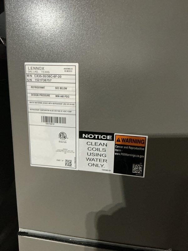 Completed scheduled ACM3/312-5 maintenance on Lennox CX35-30/48C-6F-20 rooftop unit, serial number 1521P36757. Performed comprehensive visual inspection of heat exchanger coil assembly, documenting clean condition of aluminum fins and proper spacing between components. Verified manufacturer specifications and operational parameters, photographed unit identification label and coil assembly for maintenance records.
