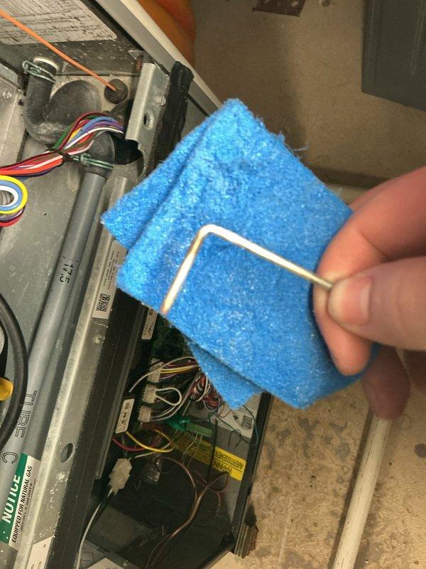 Completed routine air handler maintenance inspection on residential HVAC system located in attic space. Performed diagnostic testing using temperature probes, inspected internal components including wiring connections and control boards, and cleaned evaporator coil using specialized foam cleaning pads to ensure optimal airflow and system efficiency.