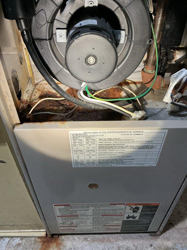 Completed comprehensive tune-up and preventative inspection on 28-year-old forced air furnace and central air conditioning system for new homeowner. Performed full system evaluation including blower motor assembly inspection, electrical connections verification, air filter housing assessment, and operational safety checks on both heating and cooling equipment. All components found to be functional with typical age-related wear; systems operating within acceptable parameters at time of inspection.