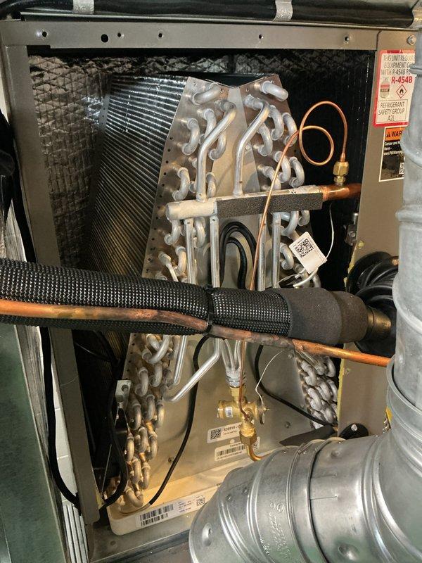 Completed annual cooling maintenance on Lennox HVAC system. Performed comprehensive inspection of evaporator coil assembly, refrigerant lines, and blower components. Replaced air filter and evaporator pad as part of routine maintenance protocol. Verified all electrical connections, checked refrigerant line insulation integrity, and confirmed proper operation of all system components. Unit operating within normal parameters upon completion.