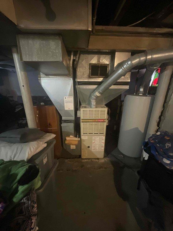 Provided estimate for complete furnace replacement in basement location. Existing 20-year-old heating system failed to turn on and required full unit replacement. Assessed installation requirements, existing ductwork connections, venting configuration, and electrical service for new equipment installation.