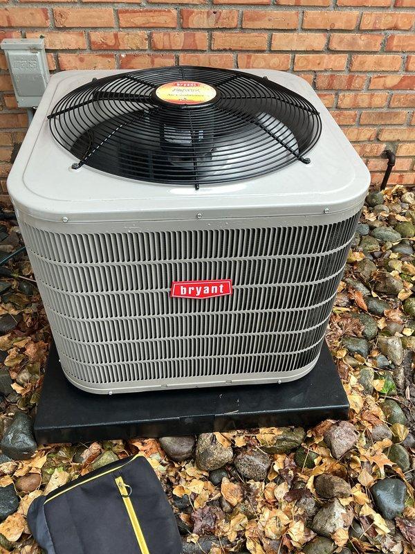 Completed annual preventative maintenance on Bryant central air conditioning system. Performed comprehensive tune-up including inspection of condenser unit, electrical connections at disconnect box, refrigerant levels, and overall system operation. Cleaned condenser coils, checked fan motor operation, verified proper airflow through top-mounted fan assembly, and confirmed unit is cycling correctly. All components found in good working condition with no repairs needed at this time. System operating within manufacturer specifications and ready for upcoming cooling season.