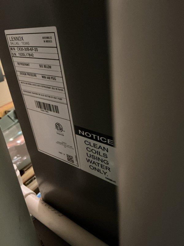 Completed annual cooling maintenance on Lennox model C33-30B-6P-20 air handler system. Inspected evaporator coil assembly, verified refrigerant lines and connections, documented system specifications and manufacturer labeling, and confirmed all components operational for the cooling season.
