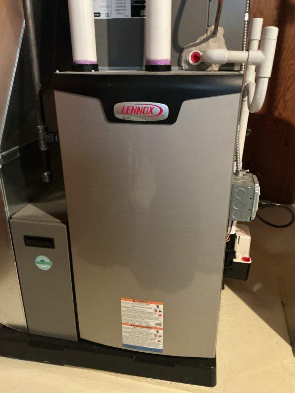 Performed complimentary preventative maintenance inspection on Lennox furnace and air conditioning system. Accessed interior components, inspected blower motor assembly, circuit board, heat exchanger, electrical connections, and verified all wiring and safety controls were functioning properly. All systems operational with no issues found.