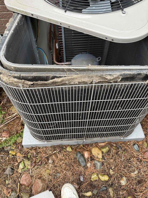 Completed annual cooling maintenance on outdoor condensing unit. Removed top panel to access internal components, inspected fan motor and blades, checked refrigerant lines and heat exchanger coils for proper operation. Utilized Fieldpiece SMAN manifold gauge to verify system pressures and temperatures, confirming all readings within manufacturer specifications. Unit operating efficiently with no issues found.