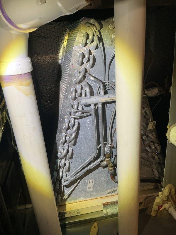 Completed ACM preventive maintenance on Lennox split system. Inspected outdoor condenser unit and indoor evaporator coil, verified refrigerant lines and connections, and brought replacement filter for system renewal. All components found operating within normal parameters.