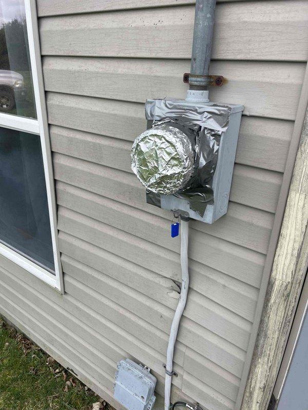 Conducted comprehensive HVAC system evaluation for manufactured home following home show appointment request. Assessed existing furnace installation located in interior closet utility space and exterior air conditioning components. Documented current equipment configuration including wall-mounted electrical service with temporary protective covering and conduit routing. Evaluated system compatibility and spatial requirements for complete furnace and air conditioning replacement. Prepared detailed quote for full HVAC system installation tailored to manufactured home specifications and existing infrastructure layout.