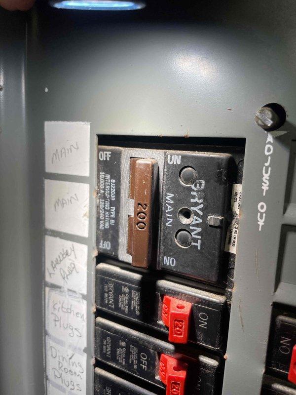 Completed electrical estimate for new whole home generator installation at manufactured home following home show appointment. Assessed existing 100-amp main electrical panel with Bryant breakers and evaluated basement utility area infrastructure including sump pump system and available space for generator equipment installation. Documented current electrical configuration and site conditions to provide comprehensive proposal for generator system integration with existing electrical service.