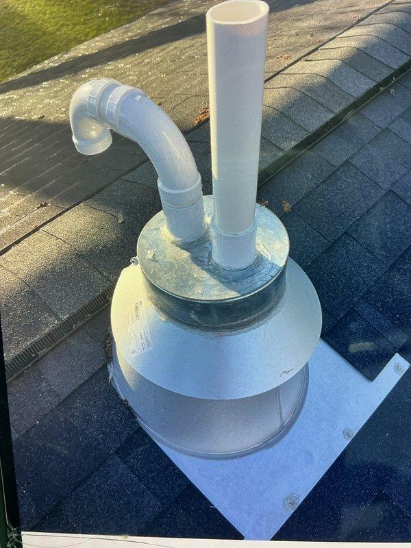 Responded to report of water leaking near furnace with suspected exhaust pipe issue on 5-month-old equipment located in basement. Upon inspection, identified improper condensate drainage from high-efficiency furnace exhaust termination on roof. Verified PVC vent piping installation and confirmed condensate was accumulating and draining back through exhaust system rather than being properly routed away from termination point. Corrected venting configuration to ensure proper condensate drainage and prevent water intrusion, restoring system to manufacturer specifications.