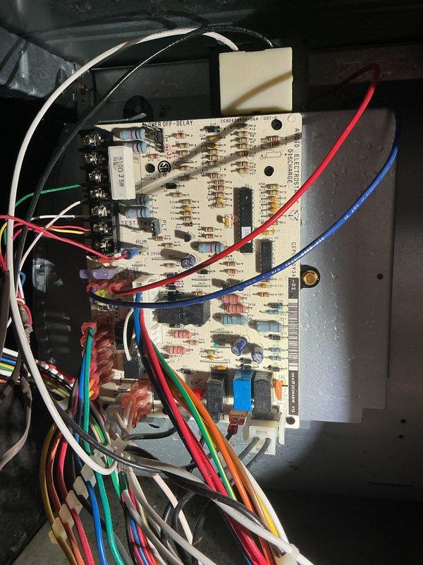 Responded to no-heat call on 4-year-old forced air furnace that had been shut down following a basement flood. Performed comprehensive system inspection to assess potential water damage to electrical and mechanical components. Removed furnace cabinet panels to examine internal components including draft inducer motor, blower assembly, and control board for signs of moisture intrusion or corrosion. Inspected all wire connections, terminal blocks, and electrical pathways for water damage or compromised insulation. Examined control board circuitry, relays, and integrated components for functionality. Verified condensate drainage system and PVC piping for proper configuration. Documented internal component condition with photographs showing blower motor, draft inducer, wiring harnesses, and control board assembly. All major components appeared dry with no visible water damage or corrosion present. System remained off per homeowner request pending further evaluation and clearance to restore