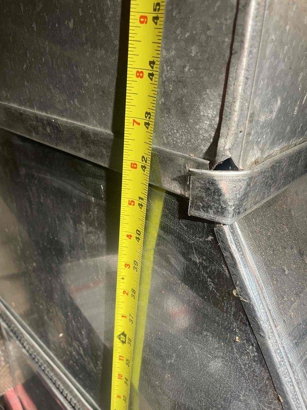 Conducted on-site assessment for replacement estimate of existing furnace and tank-style water heater. Measured supply and return ductwork dimensions to verify compatibility with new equipment specifications, documenting 18-20 inch trunk line and associated plenum connections. Photographed existing HVAC infrastructure including galvanized ductwork configuration, mounting locations, and clearance requirements for accurate equipment sizing and installation planning.