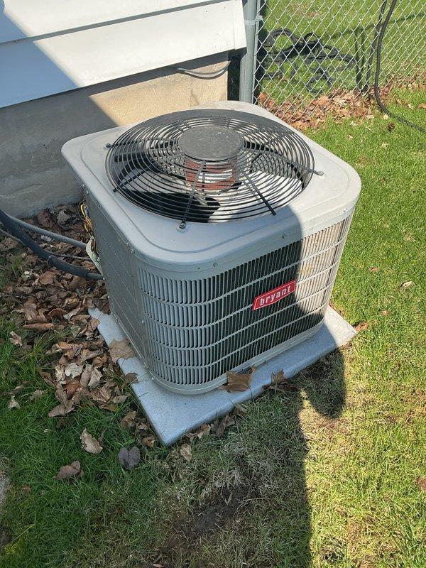 Completed routine preventive maintenance on a 10-year-old Bryant residential split-system air conditioning unit. Performed comprehensive AC tune-up including inspection of condenser unit exterior condition, verification of proper fan operation, and assessment of overall system functionality. Unit was found operating properly with no deficiencies noted at time of service. Outdoor condenser cabinet and components showed normal weathering consistent with age and outdoor exposure. All maintenance tasks completed successfully with system left in good working order.