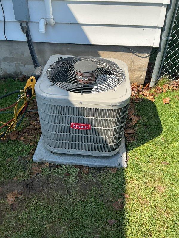 Completed routine preventive maintenance on a 10-year-old Bryant residential split-system air conditioning unit. Performed comprehensive AC tune-up including inspection of condenser unit exterior condition, verification of proper fan operation, and assessment of overall system functionality. Unit was found operating properly with no deficiencies noted at time of service. Outdoor condenser cabinet and components showed normal weathering consistent with age and outdoor exposure. All maintenance tasks completed successfully with system left in good working order.