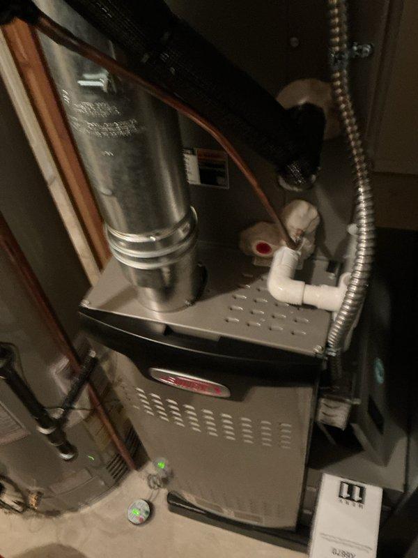 Completed scheduled Air Care Maintenance on residential HVAC system. Inspected furnace unit and associated components including expansion tank, copper piping, and condensate drainage system. Replaced air filter as needed and verified proper operation of all mechanical systems and electrical connections.