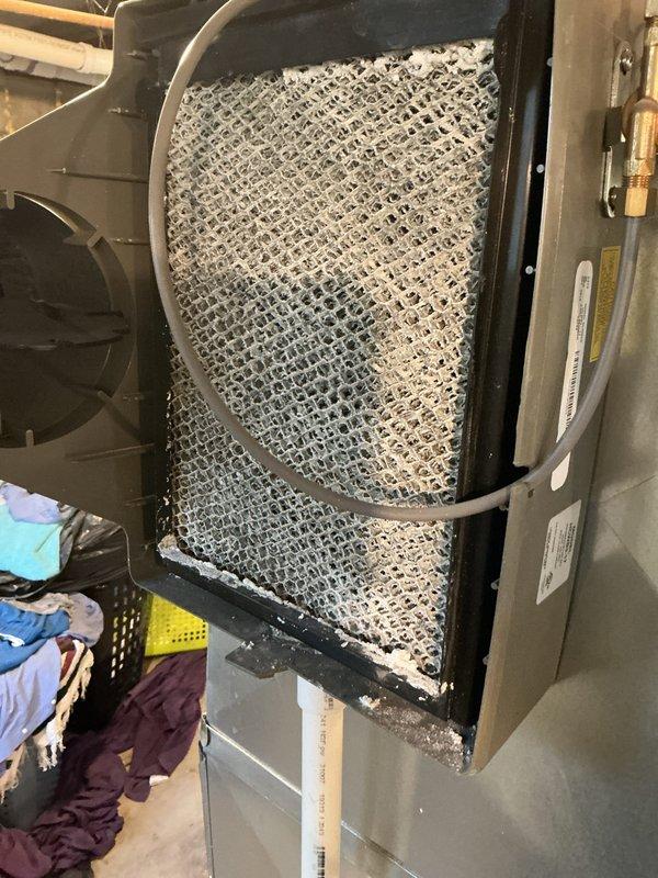 Completed annual cooling maintenance inspection on residential HVAC system. Removed heavily soiled furnace filter showing significant dust and debris accumulation, replaced with new pleated 16x25 filter to restore proper airflow and system efficiency. Performed standard ACM protocol including system inspection and component verification to ensure optimal operation for the cooling season.