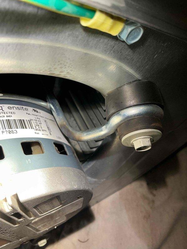 Responded to no heat call on 2+ year old furnace in basement following recent flooding event. Upon inspection, found blower motor assembly had sustained water damage and failed, preventing air circulation through the system. Removed and replaced defective blower motor with new unit, reconnected all electrical connections, and verified proper operation of furnace and air handler. System tested and confirmed heating properly with adequate airflow throughout.