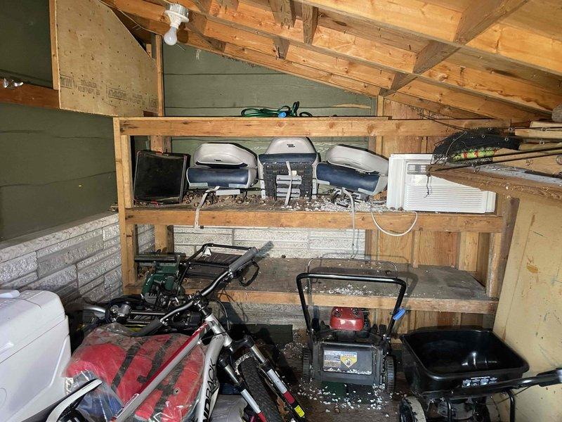 Conducted on-site assessment for air conditioning replacement estimate on 50-year-old unit currently located in laundry room. Existing system is operational but has reached end of serviceable life span. Performed measurements of existing ductwork opening, documenting 2.5-inch clearances and evaluating installation access points within confined mechanical space showing typical wear and dust accumulation on metal components and surrounding surfaces.