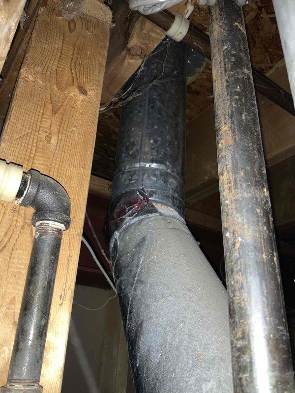 Conducted on-site assessment of a 40-year-old non-operational gas furnace and air conditioning system located in the basement for replacement estimate. Documented existing HVAC equipment configuration, including deteriorated ductwork connections, aged refrigerant lines, and outdated furnace unit in unfinished utility space with exposed framing. Provided comprehensive replacement quote for new furnace and air conditioning system under promotional program.