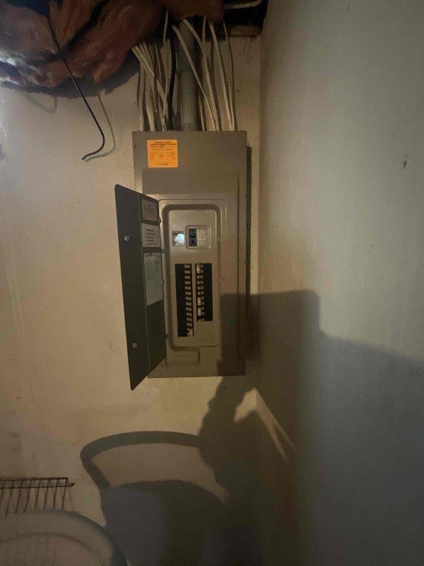 Conducted comprehensive estimate for complete HVAC system replacement in residential basement mechanical room. Existing furnace and air conditioning equipment evaluated at approximately 28 years of age, well beyond typical service life expectancy. Documented current system configuration including forced-air furnace with white air handler assembly, ductwork connections, and associated AC evaporator coil. Assessed electrical service panel capacity and existing wiring infrastructure to ensure compatibility with new equipment installation. Photographed mechanical room layout, equipment positioning, available clearances, and accessibility for replacement work. Evaluated ductwork connections, condensate drainage requirements, and ventilation exhaust routing. Reviewed electrical panel for adequate breaker capacity and proper circuit availability for new system. Provided recommendations for expedited replacement scheduling based on equipment age and homeowner urgency.