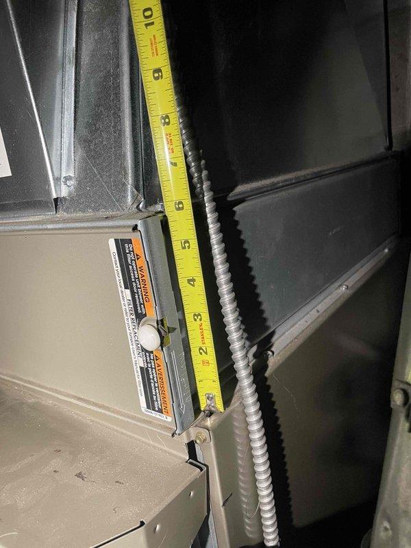 Responded to service call for 17-year-old furnace experiencing short cycling issues where unit was attempting to ignite but shutting down immediately after startup. Performed on-site assessment and took clearance measurements of existing HVAC equipment and surrounding ductwork to determine specifications for replacement unit. Provided estimate for complete furnace replacement system to resolve the operational failure and restore heating functionality to the residence.