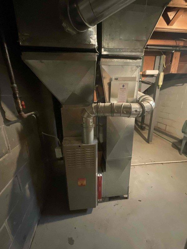 Responded to service call for non-operational water heater and HVAC system in basement utility area following flooding incident that extinguished pilot light. Conducted comprehensive assessment of furnace, air conditioning system, and water heater to evaluate equipment condition and determine repair versus replacement recommendations. Provided full system estimate covering furnace replacement, water heater installation, and air conditioning unit upgrade options, including equipment raising considerations to prevent future flood damage to mechanical systems.