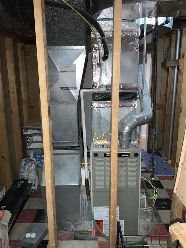 Conducted comprehensive assessment of existing 16-year-old HVAC system including furnace and air conditioning unit to provide full system replacement estimate. Evaluated current equipment configuration, ductwork condition, and installation requirements in unfinished basement mechanical room, documenting existing Trane furnace setup and associated air handling components. Provided detailed replacement recommendations for aging heating and cooling equipment along with water heater options to address homeowner's request for complete system upgrade within current season.