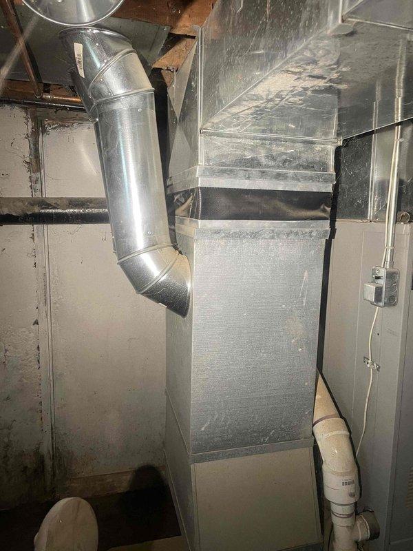 Provided comprehensive estimate for complete furnace and air conditioning system replacement in basement location. Existing 15-year-old heating unit currently operational but approaching end of service life. Assessment included evaluation of gas valve assembly, heat exchanger, existing ductwork configuration, and available space for new equipment installation. Recommended system upgrade to include both heating and cooling capabilities, as property currently lacks air conditioning.