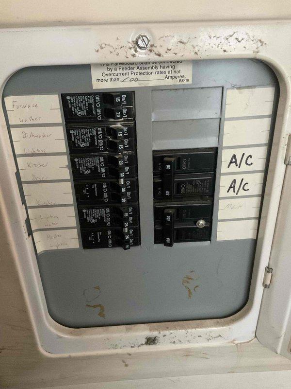 Conducted furnace replacement estimate for a 26-year-old non-operational natural gas heating system located in a utility room behind the kitchen. Assessed existing vertically-oriented air handler with connected ductwork, evaluated electrical panel capacity and circuit protection for furnace replacement compatibility, and documented equipment specifications and installation space constraints. Prepared physical estimate documentation for customer review.