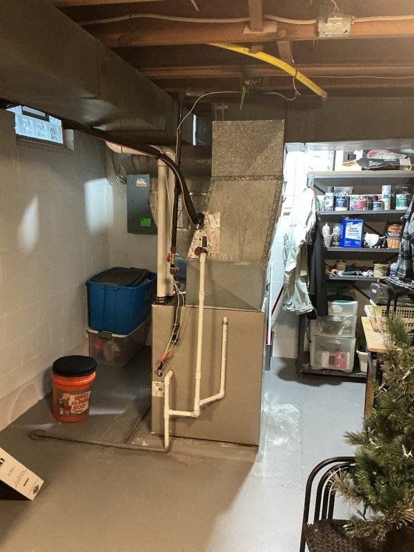 Completed annual cooling maintenance on residential HVAC system. Performed routine inspection of furnace and air handling components in basement mechanical room. Replaced humidifier filter pad and HVAC air filter per maintenance schedule. Verified proper operation of all system components and controls. Unit operating within normal parameters upon completion of service.