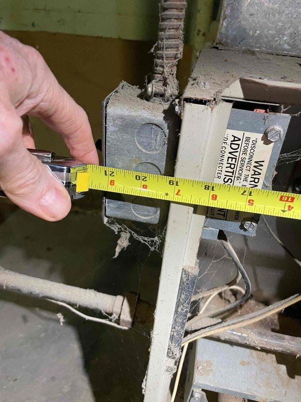 Provided comprehensive estimate for complete furnace and air conditioning system replacement in basement location. Current 30-year-old equipment remains operational but has reached end of serviceable life, showing significant wear, dust accumulation, and deterioration of surrounding components. Performed detailed measurements and photographic documentation of existing installation space and equipment dimensions to ensure proper sizing and fitment of replacement systems.