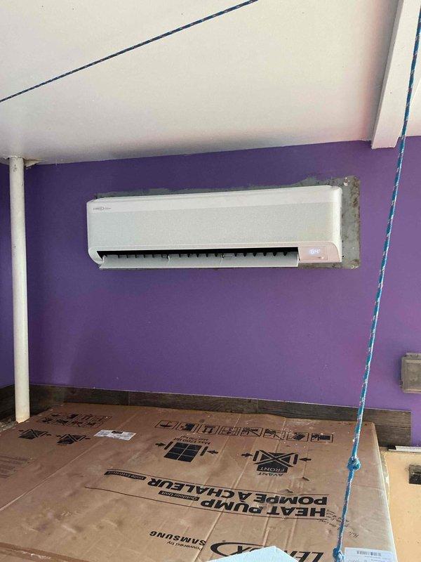 Completed warranty replacement of a non-functional mini split system in kennel facility. Removed and replaced both the indoor wall-mounted evaporator unit and outdoor Unitex condenser unit, which had failed despite being installed in 2023. Successfully installed replacement equipment with indoor head mounted on interior wall and outdoor unit properly secured on exterior mounting brackets with refrigerant lines routed through building exterior. System tested and operational upon completion, with failed equipment removed from site per warranty protocol.