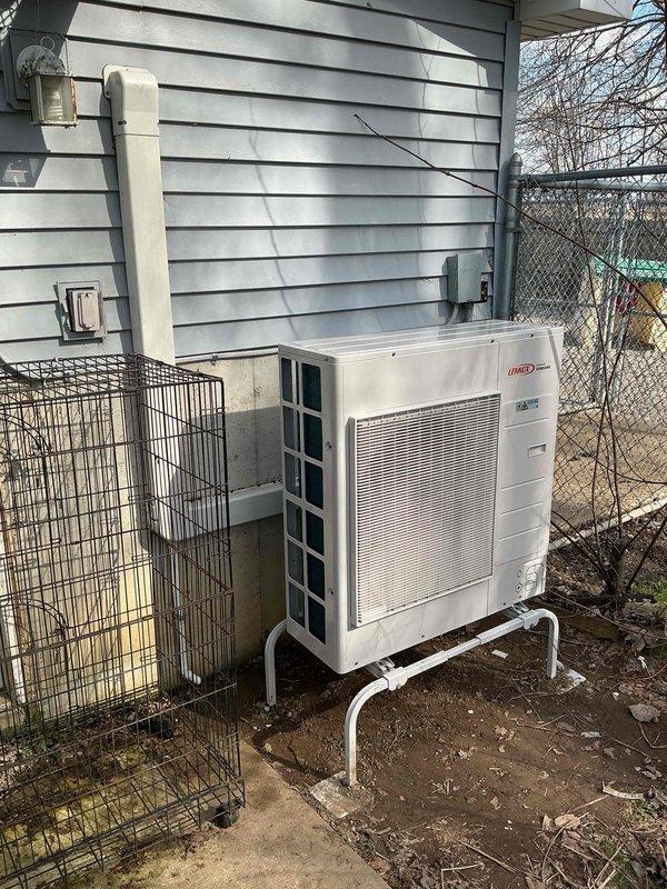 Completed warranty replacement of a non-functional mini split system in kennel facility. Removed and replaced both the indoor wall-mounted evaporator unit and outdoor Unitex condenser unit, which had failed despite being installed in 2023. Successfully installed replacement equipment with indoor head mounted on interior wall and outdoor unit properly secured on exterior mounting brackets with refrigerant lines routed through building exterior. System tested and operational upon completion, with failed equipment removed from site per warranty protocol.