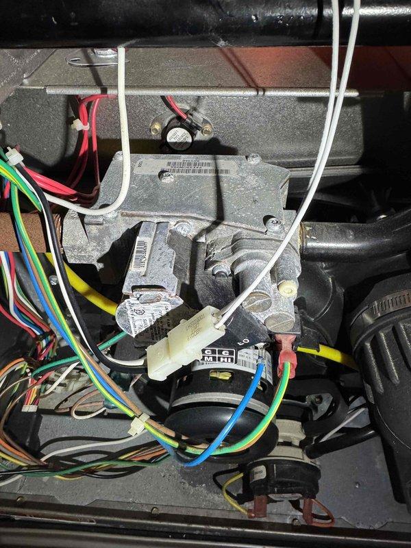 Responded to callback for heating system not reaching set temperature in basement location. Upon inspection, verified burner assembly operation with proper blue flame combustion pattern across all three burner ports. Examined gas valve control unit and confirmed all electrical connections secure, including thermostat wiring and safety circuits. Inspected blower motor assembly and associated wire harnesses for proper operation. System tested and found operating within normal parameters with no deficiencies noted at time of service.