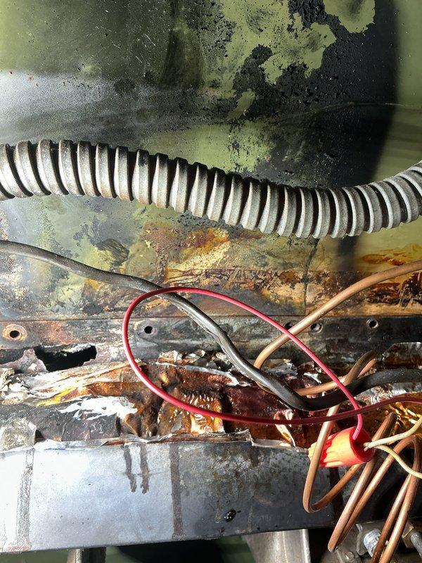 Responded to emergency service call for furnace and hot water tank tagged by gas utility due to gas leak with service disconnected to home. Upon inspection, found severely corroded gas piping system in basement with extensive rust, deterioration, and compromised threaded connections on very old equipment. Documented unsafe conditions including heavy corrosion on gas lines, mold growth on HVAC components, and overall system degradation indicating prolonged moisture exposure and end-of-life equipment status requiring immediate attention before gas service restoration.