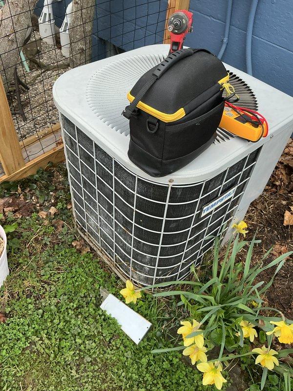 Completed annual cooling maintenance on residential outdoor condenser unit. Performed comprehensive system inspection, tested electrical components with digital multimeter confirming proper voltage and amperage readings, cleaned condenser coil and surrounding area, and verified unit operational status ahead of cooling season.