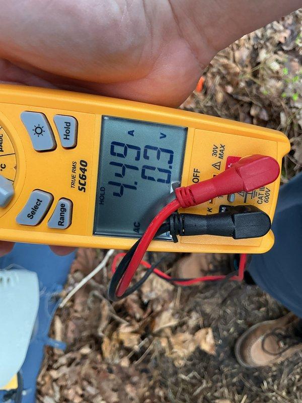Completed annual cooling maintenance on residential outdoor condenser unit. Performed comprehensive system inspection, tested electrical components with digital multimeter confirming proper voltage and amperage readings, cleaned condenser coil and surrounding area, and verified unit operational status ahead of cooling season.