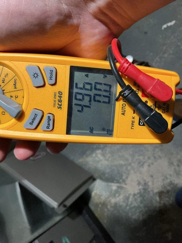 Completed annual preventive maintenance on residential air conditioning system. Performed comprehensive electrical diagnostics using digital clamp meter, recording amp draw readings of 49.9A and 46.5A on outdoor condensing unit. Inspected condenser unit components, verified proper electrical connections, and confirmed system operational parameters were within manufacturer specifications. All measurements indicated normal operating conditions with no issues identified during routine maintenance inspection.