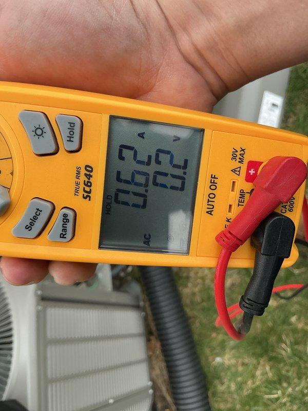 Completed annual preventive maintenance on residential air conditioning system. Performed comprehensive electrical diagnostics using digital clamp meter, recording amp draw readings of 49.9A and 46.5A on outdoor condensing unit. Inspected condenser unit components, verified proper electrical connections, and confirmed system operational parameters were within manufacturer specifications. All measurements indicated normal operating conditions with no issues identified during routine maintenance inspection.
