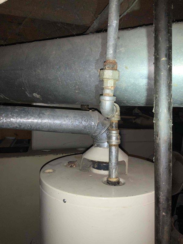 Provided estimate for complete furnace and water heater replacement in basement after gas utility company tagged equipment for gas leaks and shut off gas service to home. Assessed very old existing equipment and gas line infrastructure, documented current conditions including corroded piping and aged connections, and presented replacement options to restore safe heating and hot water service.
