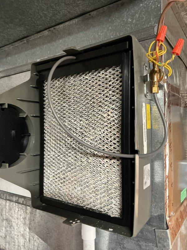 Completed annual HVAC maintenance inspection on residential heating and cooling system. Performed comprehensive evaluation of furnace, air handler, ductwork, humidifier assembly, and associated components. Inspected humidifier evaporator pad, water supply line, electrical connections, and transformer unit; verified proper operation and documented system condition with photographs. All equipment found operating within normal parameters.