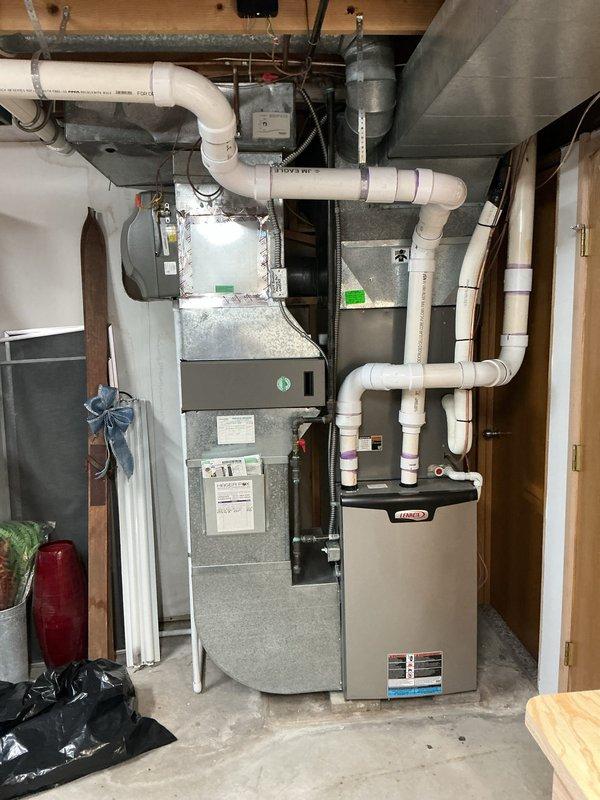 Completed annual HVAC maintenance inspection on residential heating and cooling system. Performed comprehensive evaluation of furnace, air handler, ductwork, humidifier assembly, and associated components. Inspected humidifier evaporator pad, water supply line, electrical connections, and transformer unit; verified proper operation and documented system condition with photographs. All equipment found operating within normal parameters.