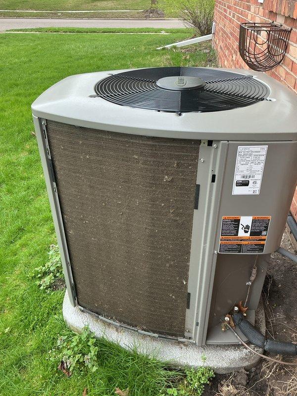 Completed scheduled Air Care Cooling maintenance on Lennox EL17XC1 condenser unit utilizing HFC-410A refrigerant. Performed comprehensive system inspection, documenting unit condition with exterior showing normal weathering and dirt accumulation on intake surfaces, confirmed proper refrigerant line connections and verified operational status of all components per manufacturer specifications.